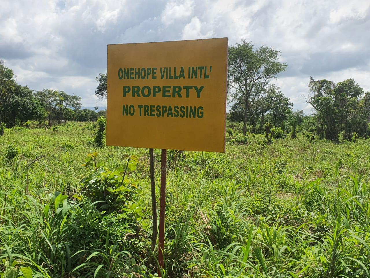 OneHope Villa International property sign on the farm
