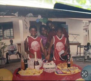 Children at OneHope International celebrating a birthday together around the cake