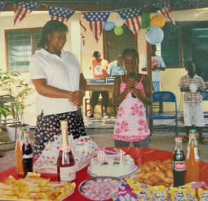 A OneHope International caregiver and child sharing a birthday celebration